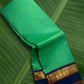 Kanchipuram silk saree in jade jewel green with navy blue border Korvai weave folded view