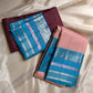 Kanchipattu silk saree in jamun purple with bright aqua border Zari Kattam weave traditional zari detail