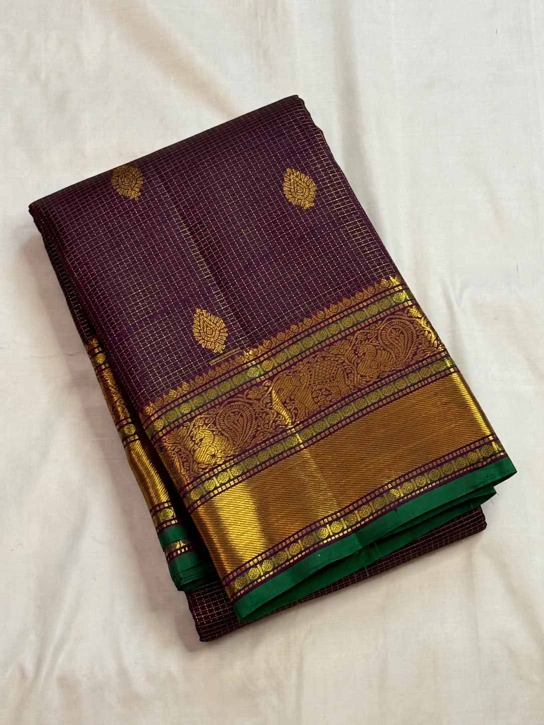 Jamun purple Kanjivaram handwoven silk saree with emerald green selvedge