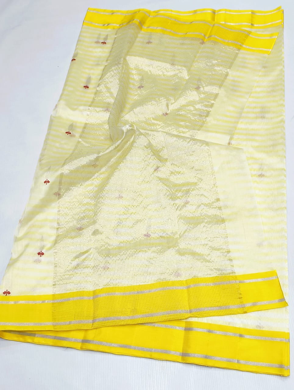 Moonlit ivory Chanderi handloom saree, alternate view of the marigold-yellow border with fine silver-grey stripes.