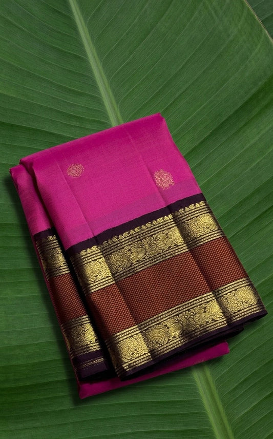 Jewel Orchid Pink Kanchipuram silk saree with brown rettapet korvai border and zari woven peacock mayil butta