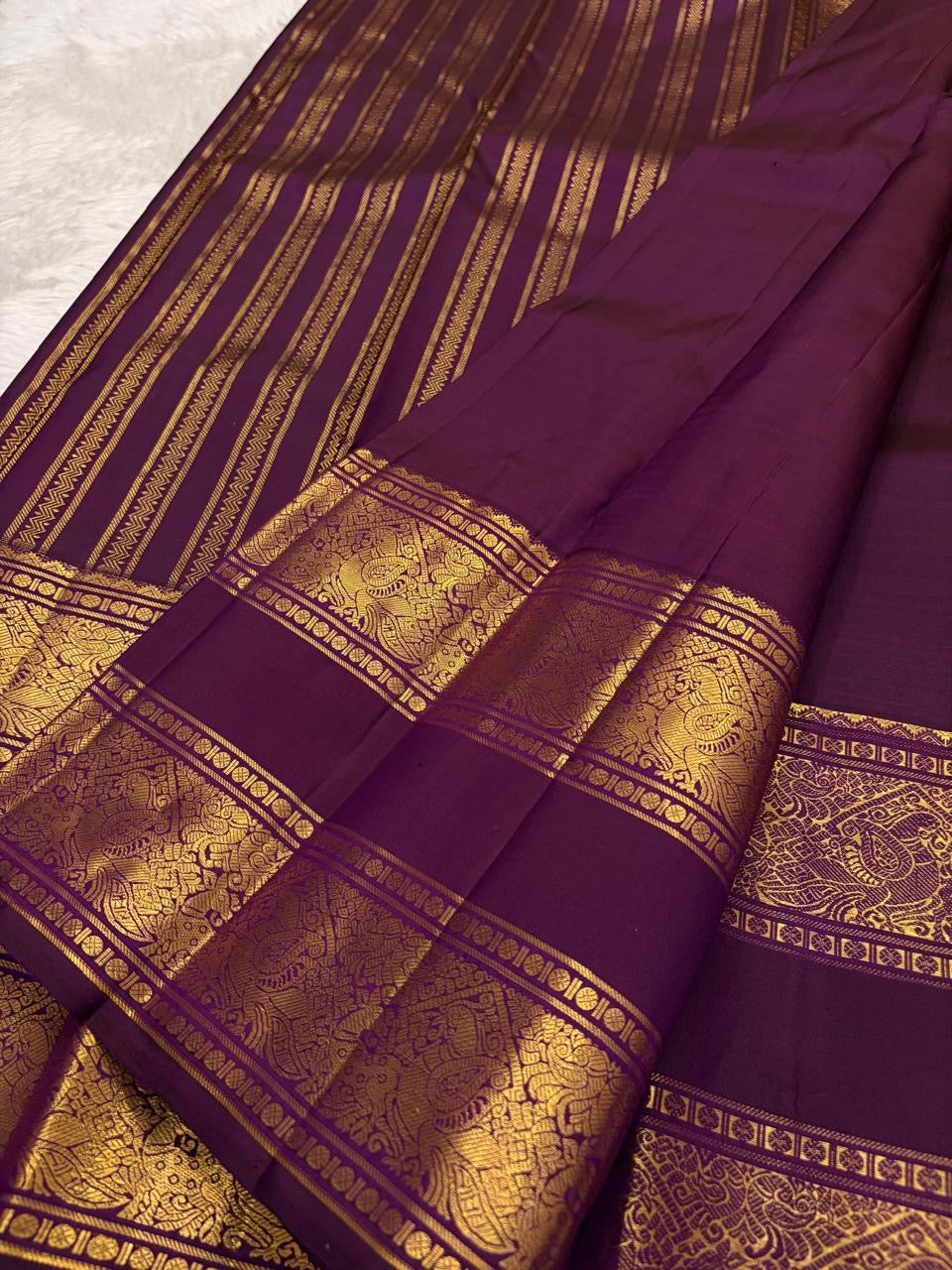 Jewel Purple and Antique Gold Handwoven Pure Silk Kanchipuram Saree with Rettapet Border and Mayil Chakram Butta