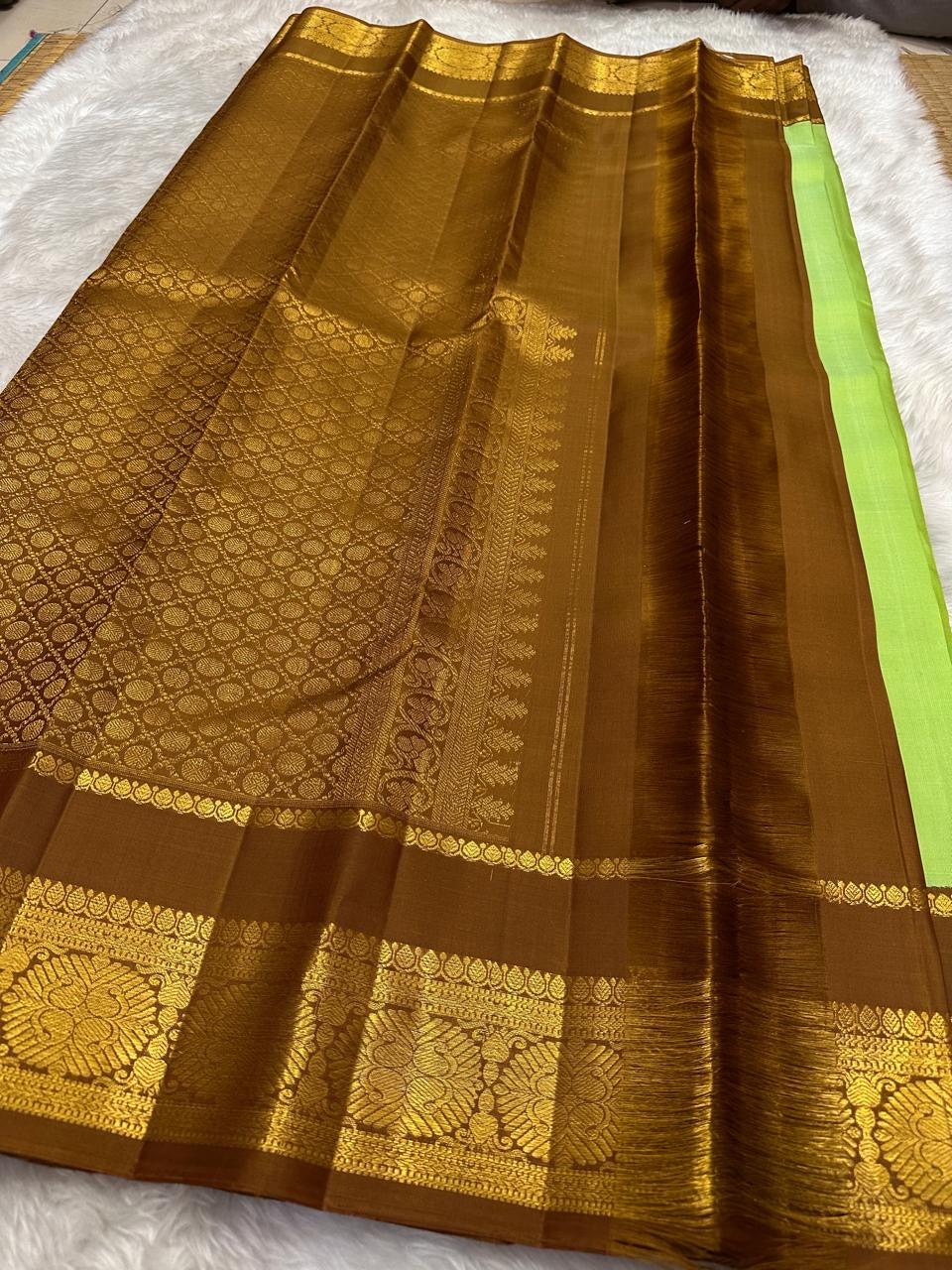 Deep Kaapi Brown Kanchipuram border with lotus medallions and Vanki temple edge