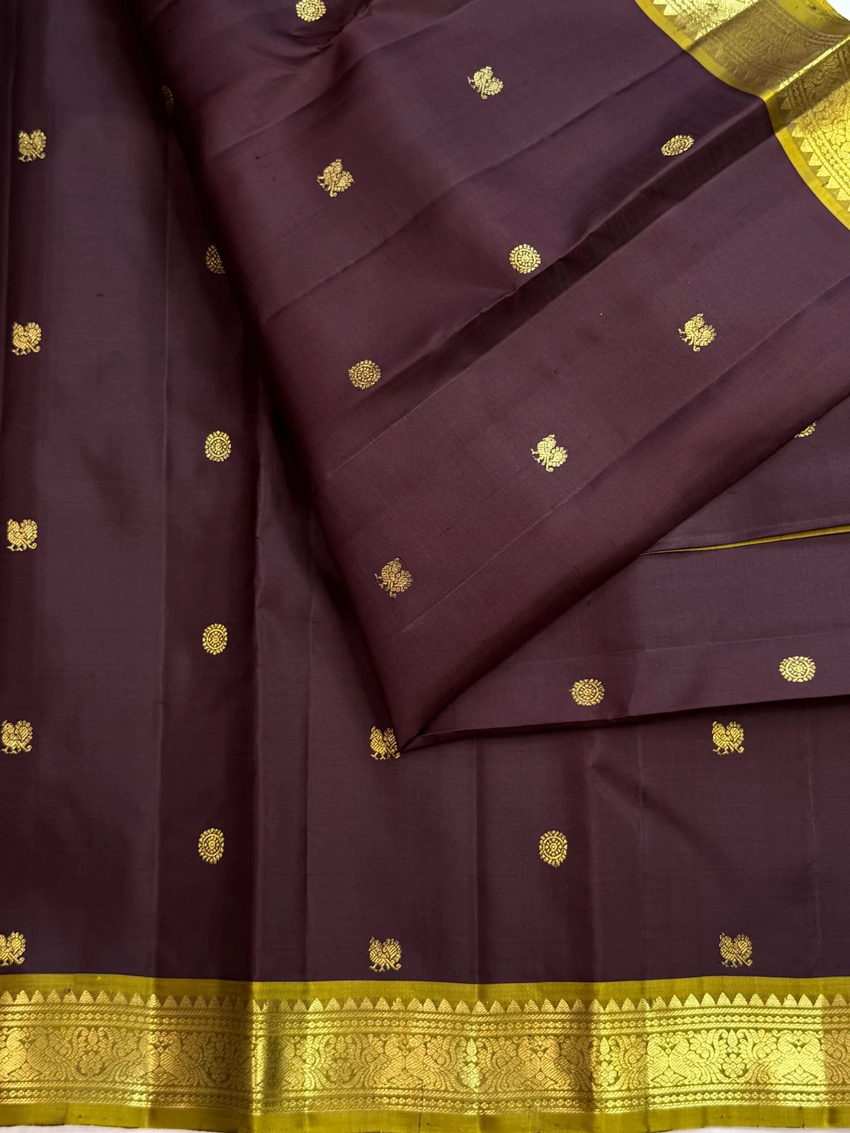 Pure silk Kanchipuram saree in Kaapi Brown with Mehendi Green, traditional handwoven border and zari detail