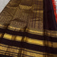 Close-up of the deep Kaapi Kottai brown gold zari Varisaipet border