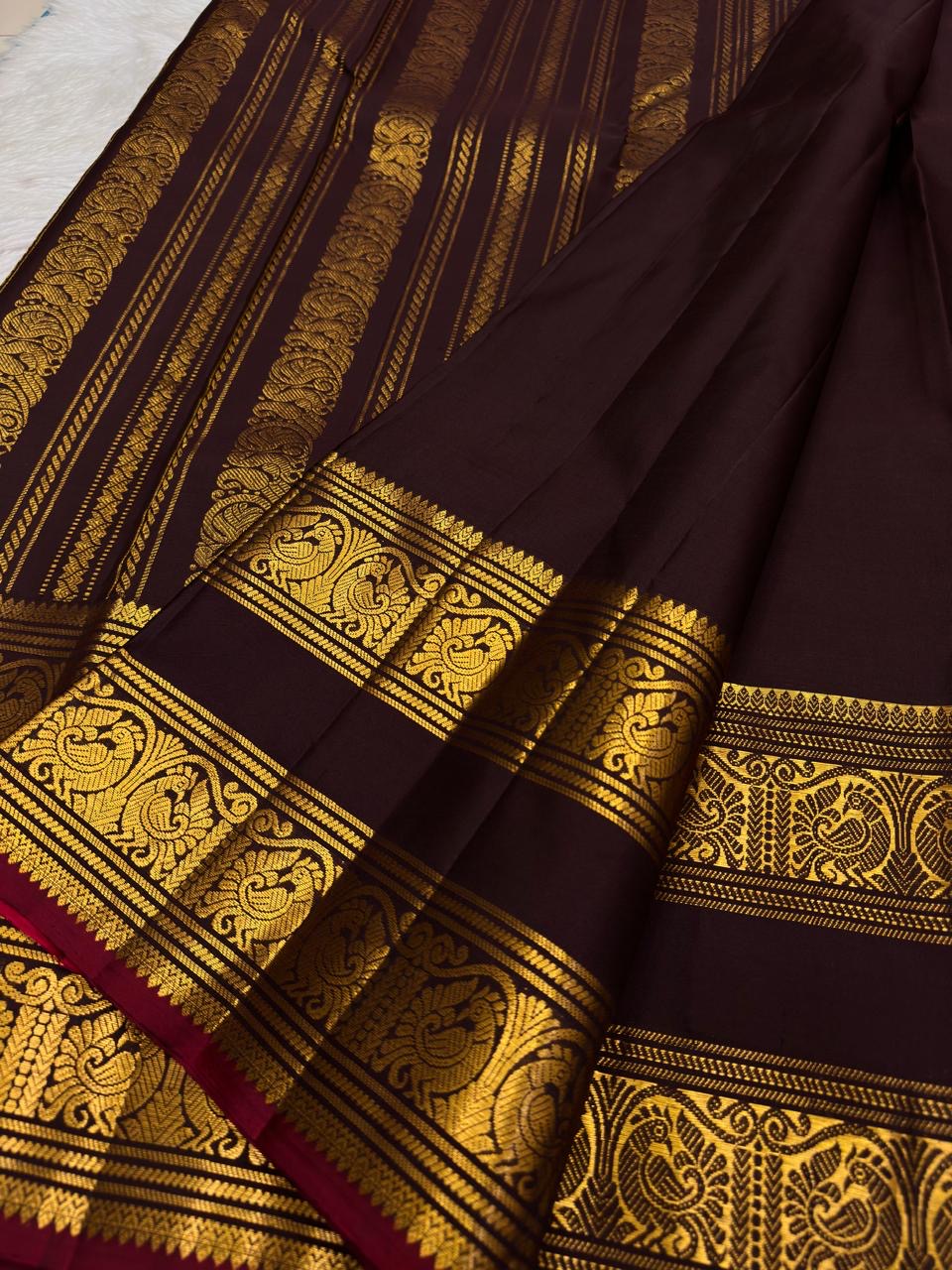Kaapi Kottai Brown pure silk Kanchipuram body with spaced gold zari buttas