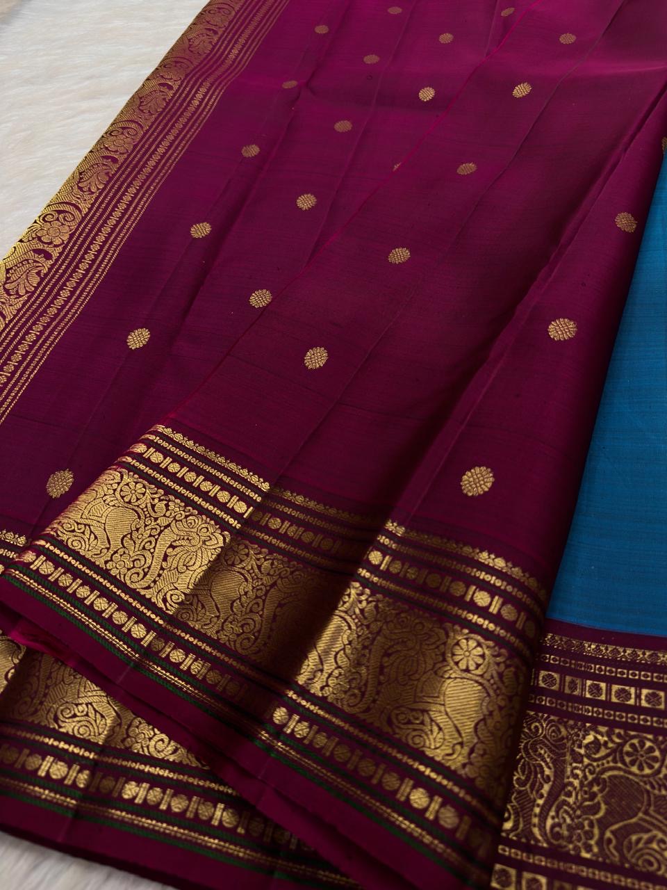 Close Arakku border detail with intricate floral classic-gold zari work on Pure Silk Kanchipuram.