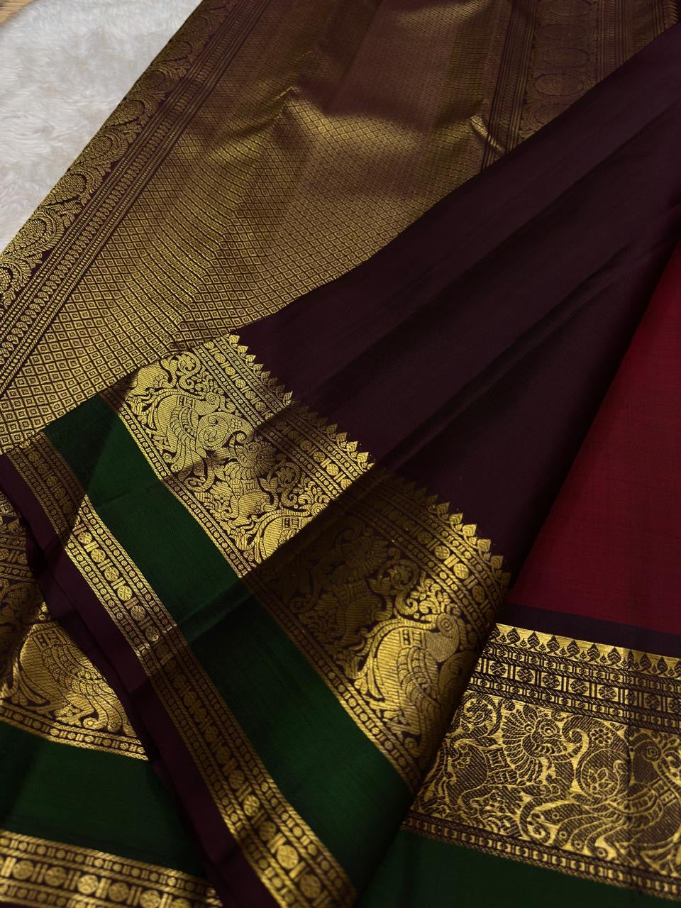 Arakku Red and Deep Green Handwoven Pure Silk Kanchi Pattu Saree with Kamalam Mayil Butta and Silk Thread Zari Border