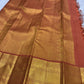 Gold zari detail of Kamalam and Mayil buttas, warm-ivory Kanjipuram Korvai saree