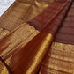 Cinnamon Rustic Brown Pure Silk Kanchipuram Zari Kattam saree with richly worked classic-gold border.