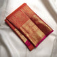 Kanakambaram orange Pure Silk Kanchipuram saree with Maanga buttas and broad Mayil gold zari Pettu