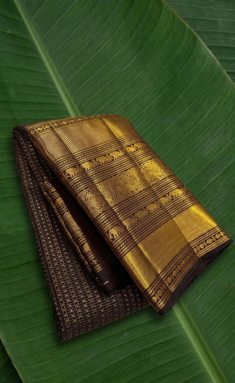 Pure Kanchipuram Zari Kattam silk saree in Kanchana brown with Yaanai motif antique gold border