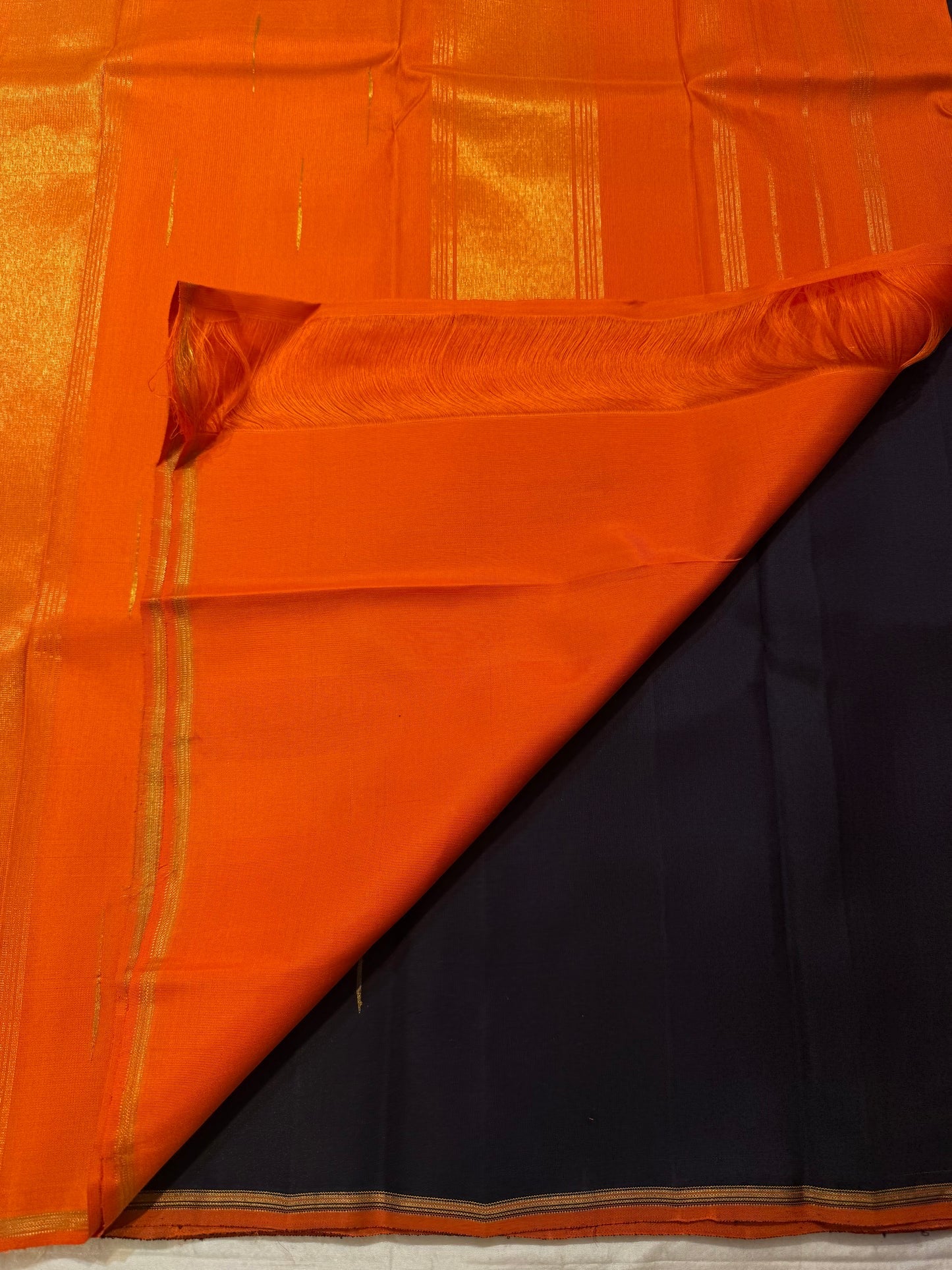 Pure silk Butta saree with widely spaced Mullai Moggu jasmine-bud zari motifs.