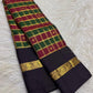 Kanchana purple Kaal Irangiya border on a Kanjivaram Paalum Pazhamum saree