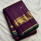 Deep purple Kanchipuram silk with fine intersecting gold Zari Kattam checks and spaced zari buttas.
