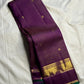 Kanchana Purple pure silk Kanchi Pattu Zari Kattam saree with gold zari border and green edge.
