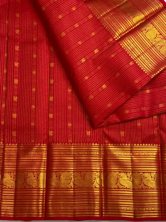 Vermilion red handwoven pure silk Kanjivaram Varisaipet saree with gold zari brocade border, photo 1 of 5