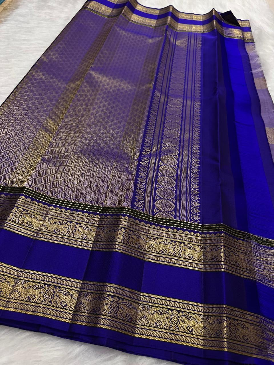 Lilac and blue handwoven pure silk Kanchipuram Rettapet saree — saree neatly folded