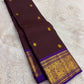 Aubergine and royal violet pure silk saree with a grand antique gold zari pallu