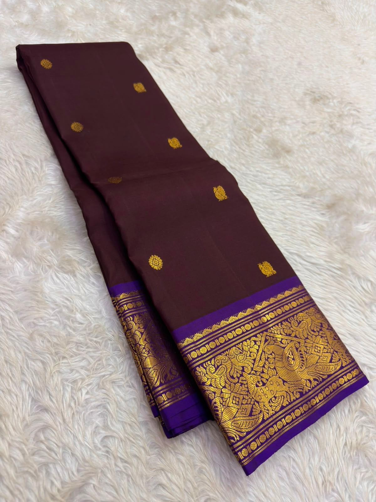 Aubergine and royal violet pure silk saree with a grand antique gold zari pallu