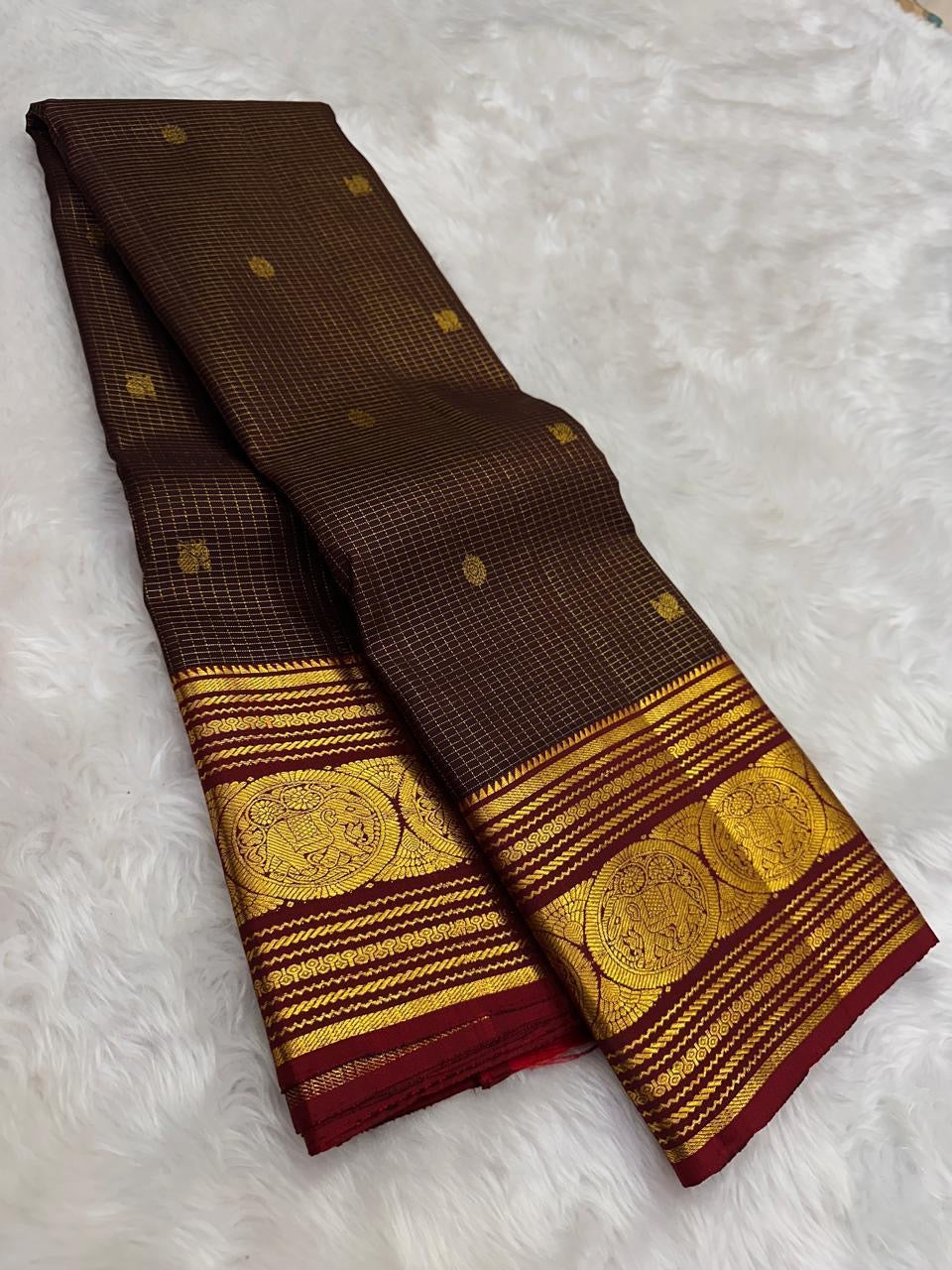 coffee brown Kanchipuram silk saree with zk-yb weave folded view