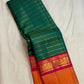 Peacock teal Korvai pure silk Kanchipuram saree with thick Veldhari body, double Korvai border and sunset-orange grid pallu, Idam Living (photo 1 of 5)