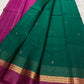 Emerald Green and Vadamalli Magenta lightweight Kanchipuram silk saree, spaced buttas and scrolling floral zari border; full layout