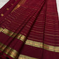 leaf green border detail of deep red Kanchipuram silk saree
