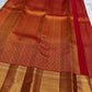 zk pallu detail of vermilion red Kanchipuram silk saree