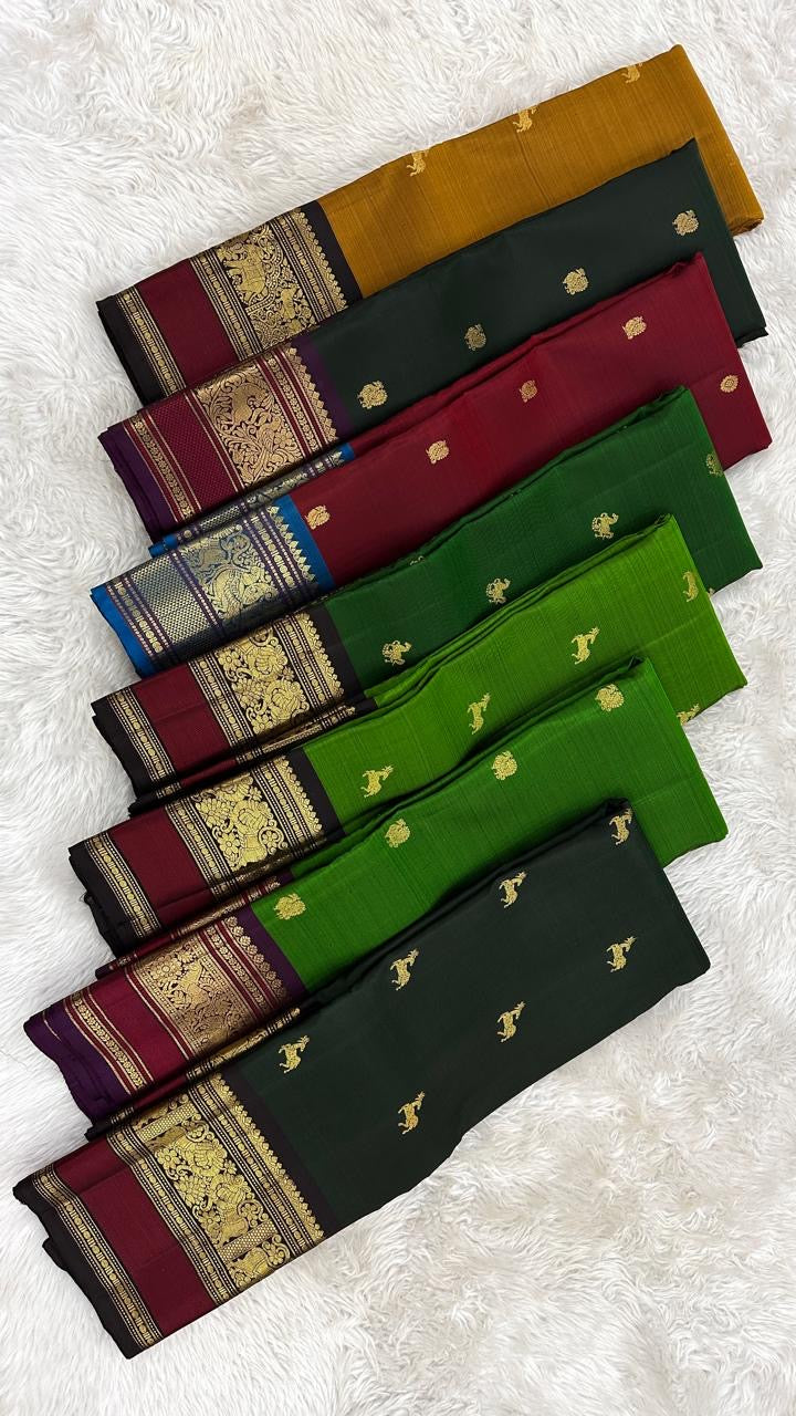 Green red Kanchipuram pattu saree border detailing with korvai pattern