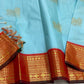 Sky blue Kancheepuram silk saree with digitally printed pichwai cow motifs and gold zari border