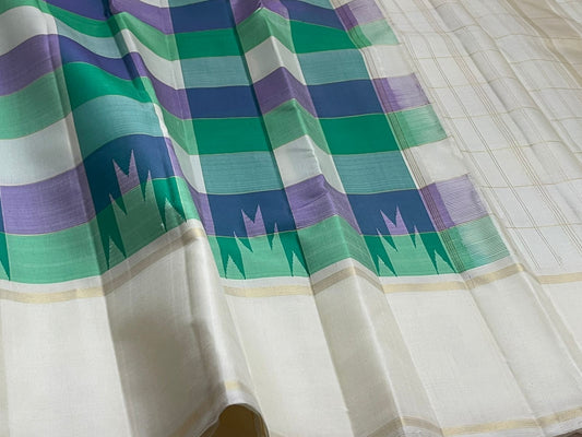 Idam Living leaf green pure Kanchipuram silk saree with magenta Varisaipet zari jaal