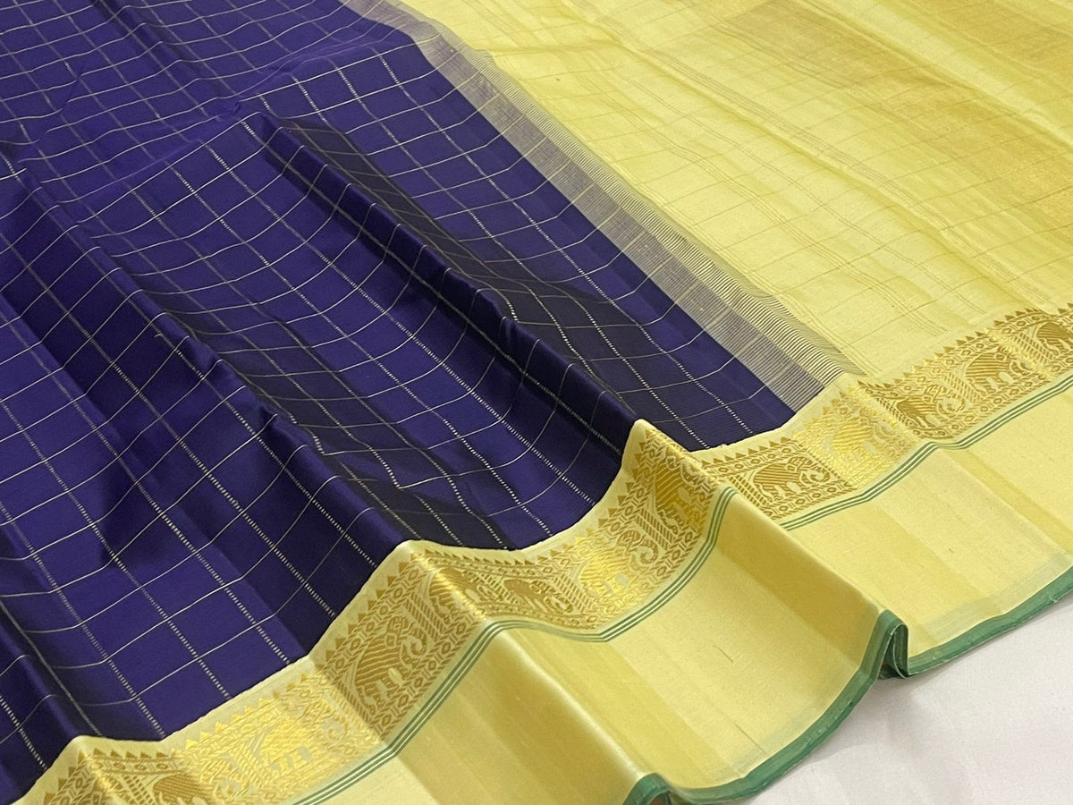 Neelam Blue Handwoven Pure Silk KanchiPattu Kanchi Kattam Saree with Kaal Irangiya Ivory Gold Border
