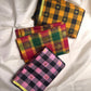 Traditional Yanai elephant gold zari buttas on checked Kanjivaram silk