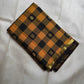 Turmeric Yellow Kanchi Kattam saree with black checks and gold zari buttas