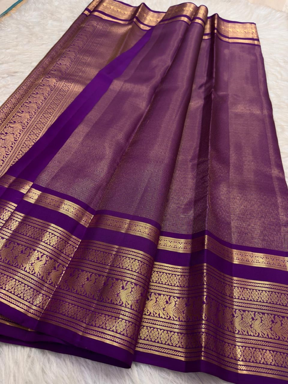 Deep aubergine purple Kanchipuram zari kattam saree, showing body, border and detailed gold zari pallu