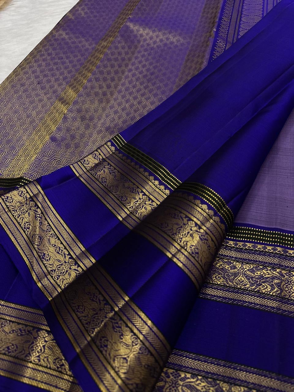 Lilac and blue handwoven pure silk Kanchipuram Rettapet saree — close view of the body weave and texture