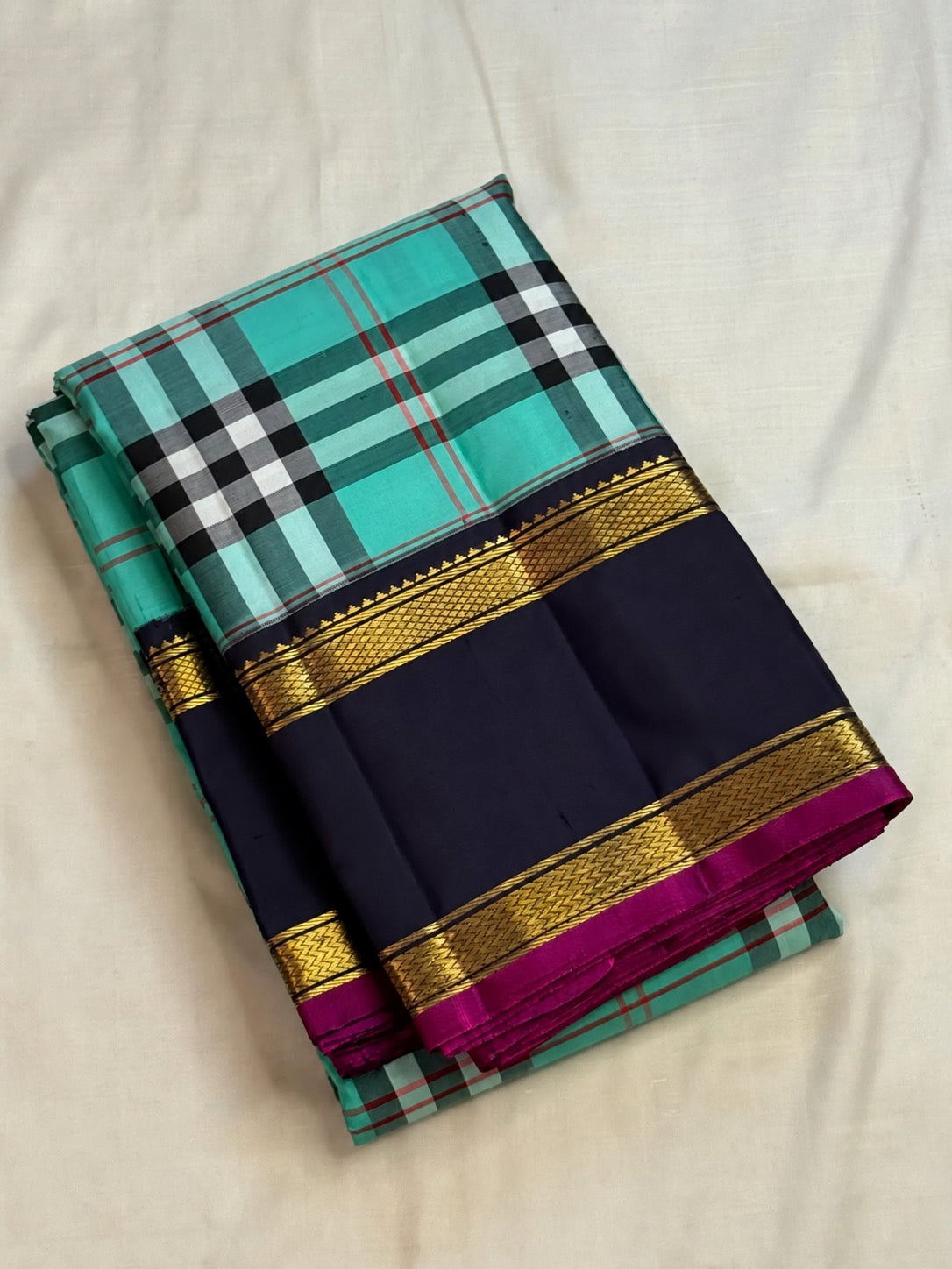 Lagoon turquoise Paapli checks pure silk Kanchipuram saree with midnight navy Rettapet border and gold Seer pallu, Idam Living (photo 4 of 5)