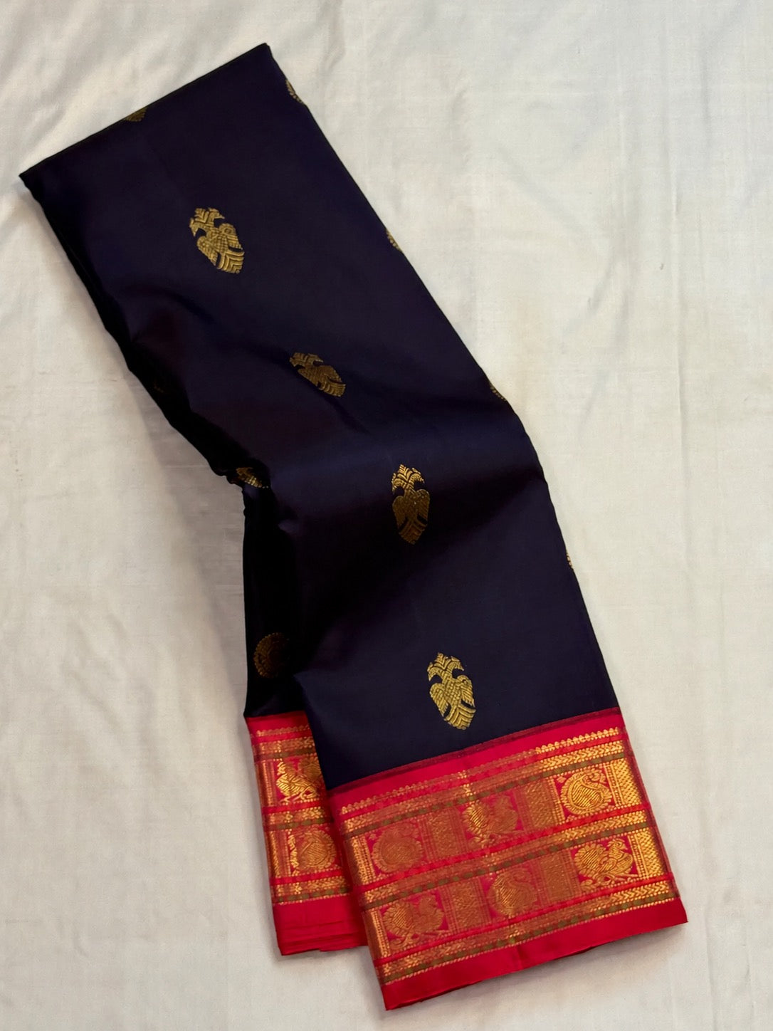 Midnight navy pure silk Kanchipuram saree with Gandaberunda buttas and double peacock-paisley border in rani pink, Idam Living (photo 3 of 6)