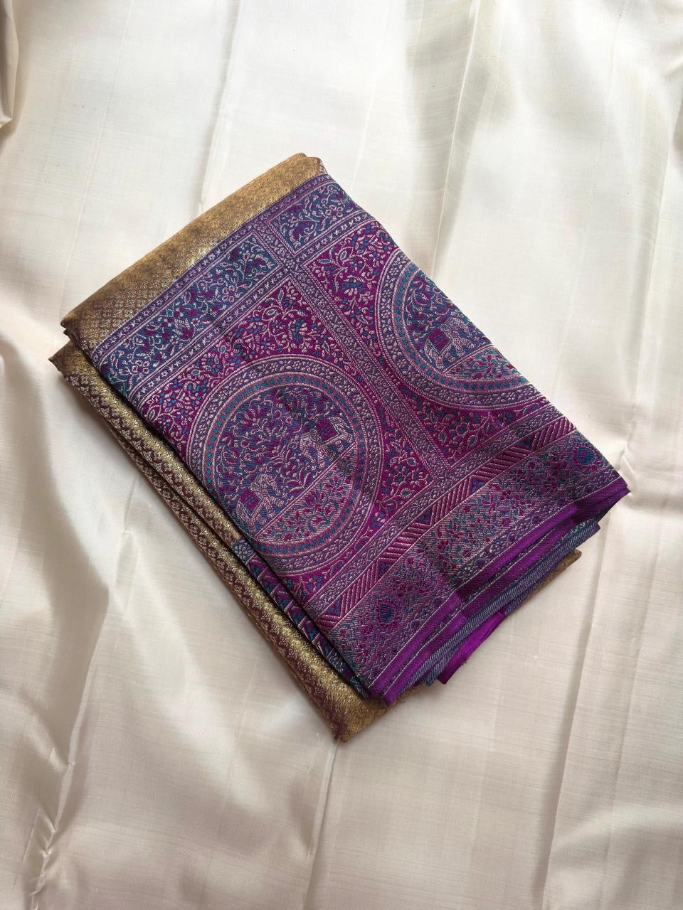 Antique gold handwoven pure silk Banarasi-Kanchipuram fusion saree with Kathiripoo purple, gold zari latticework and elephant medallions