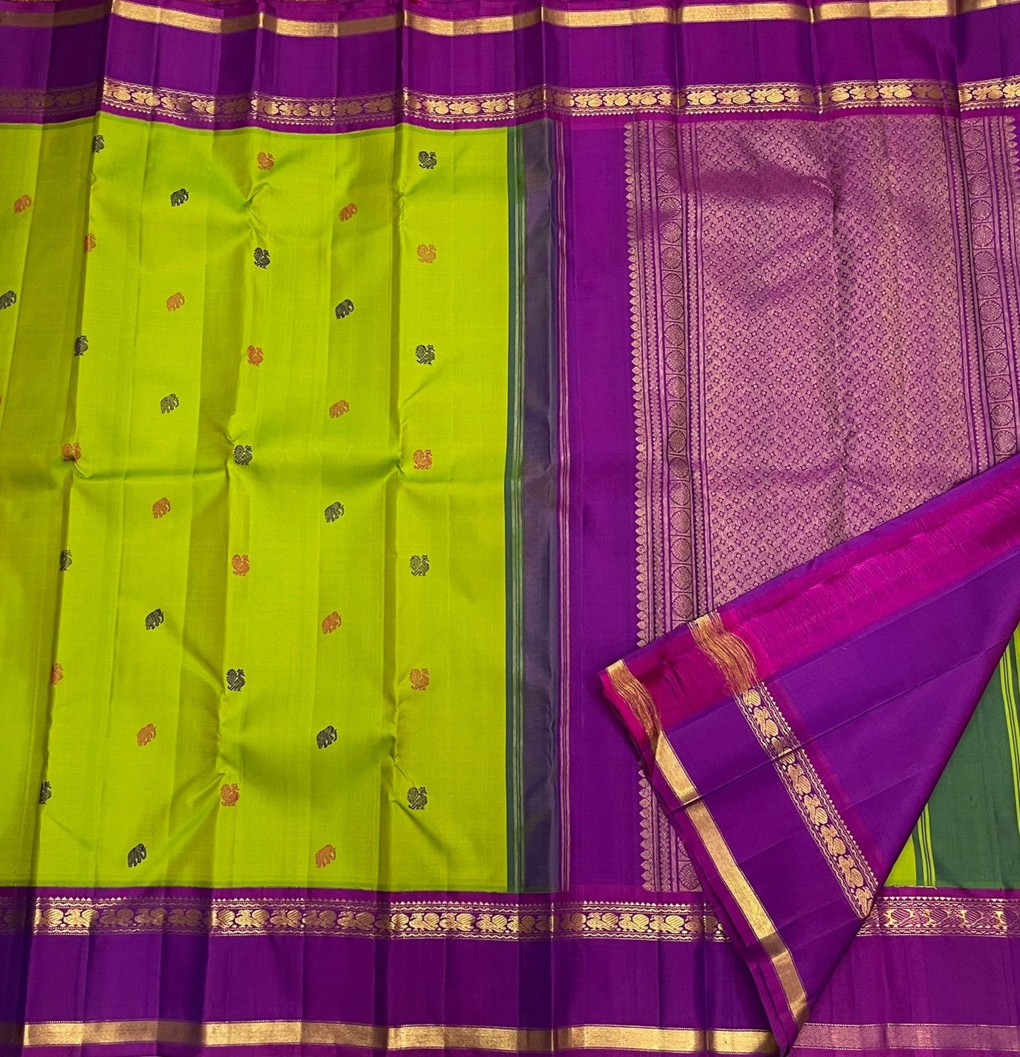 Kanjivaram pattu saree in chartreuse with mayil butta and rettapet zari border styling view