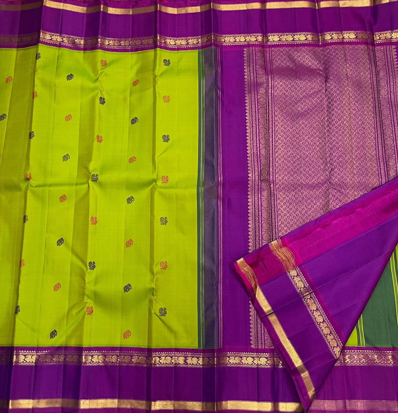 Kanjivaram pattu saree in chartreuse with mayil butta and rettapet zari border styling view