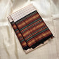 Handwoven Kanchipuram silk saree ivory black kattam design highlighting fine silk thread detailing and grid structure