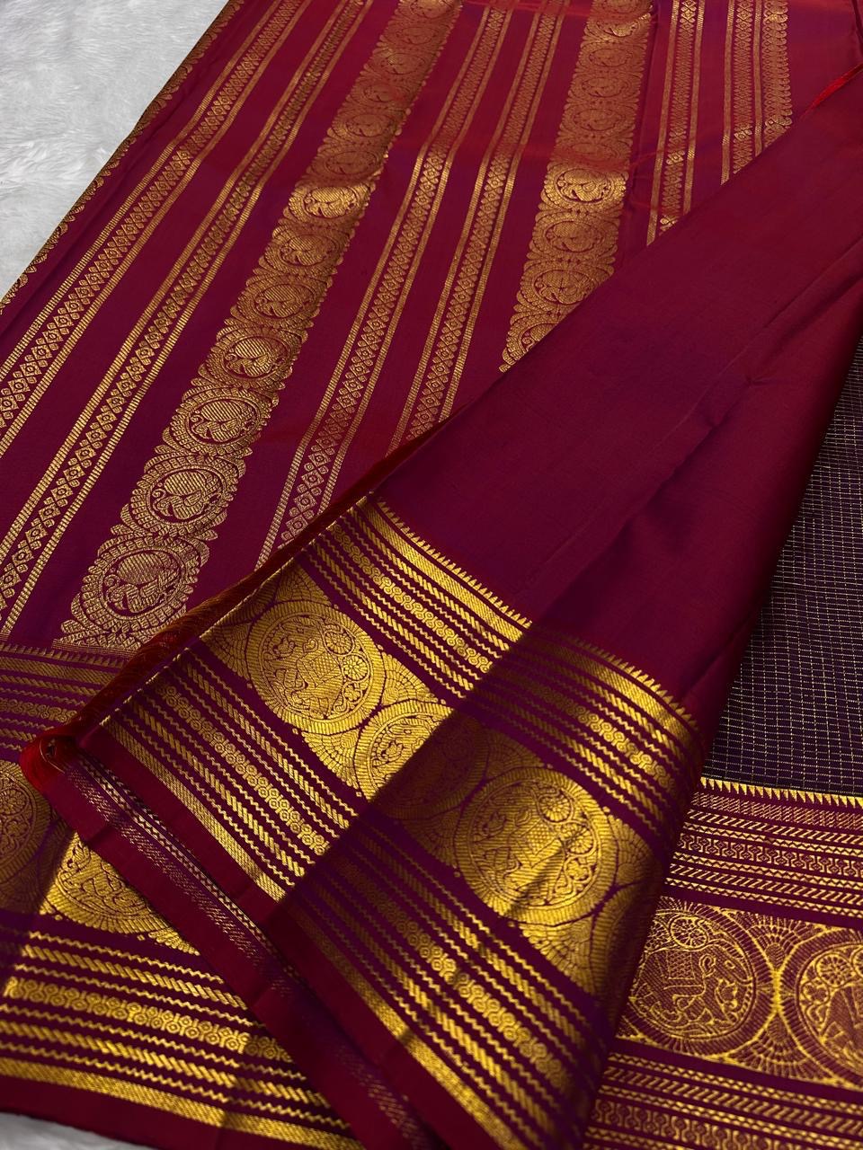 traditional tested zari detail on plum purple Kanchipuram silk saree