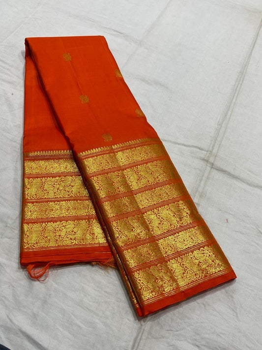 Orange handwoven pure silk Kanchipuram Varisaipet saree — overview of the full saree drape