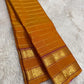 plum border detail of mustard gold Kanchipuram silk saree