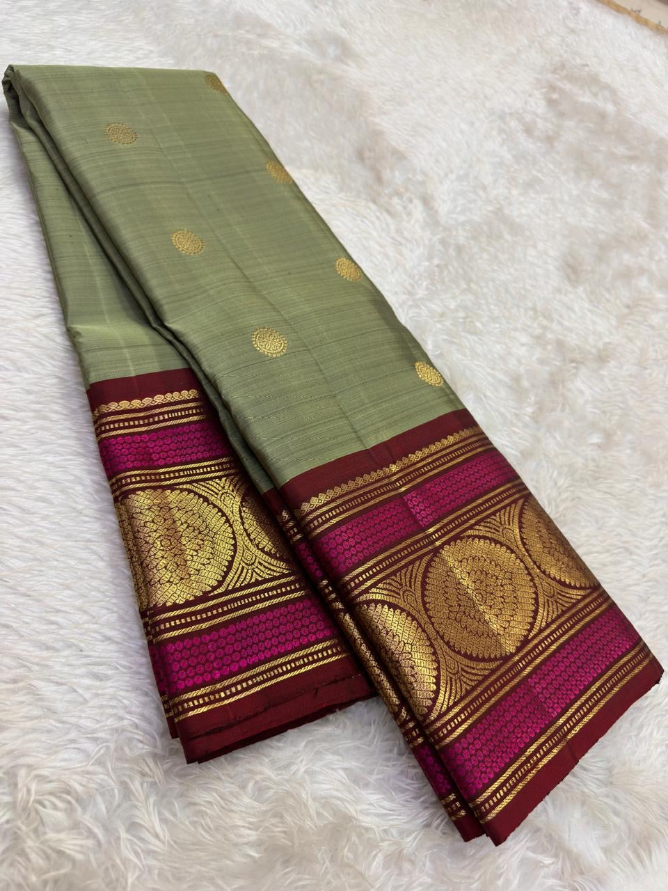 kb pallu detail of sage green Kanchipuram silk saree
