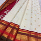 Ivory pure silk Kanchipuram saree, ornamental pallu full view with warm ivory with arakku-red, vermilion and manthulir-green accents