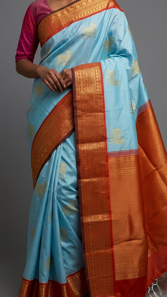 Pichwai cow motif Kanjeevaram silk saree in sky blue with intricate antique gold zari border