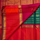 Zari buttas on a peacock-green pure silk Kanchipuram saree, Idam Living (photo 6 of 8)